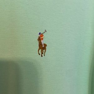 Light green men’s Ralph Lauren polo shirt